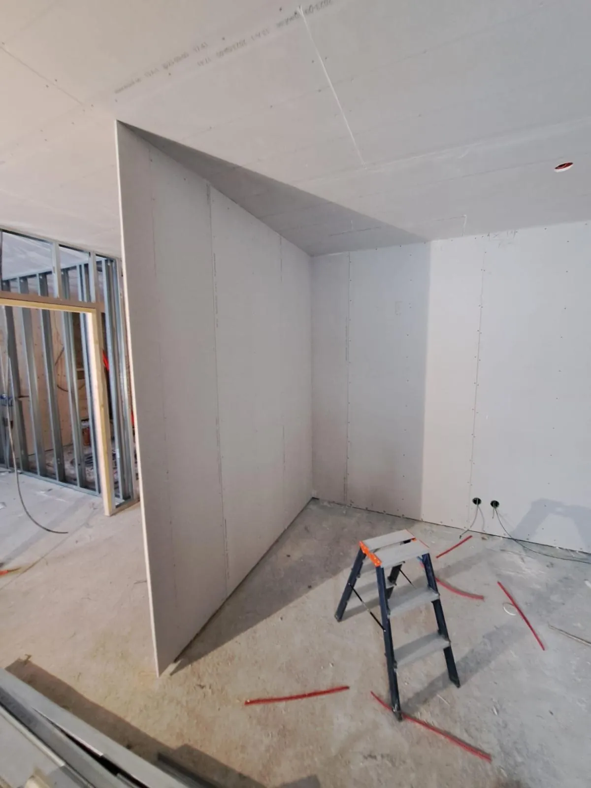 Prefab wall and construction work in progress